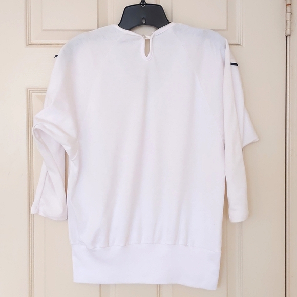 NWOT. Woman's V-Neck knit top with design and decorations. - Picture 3 of 3